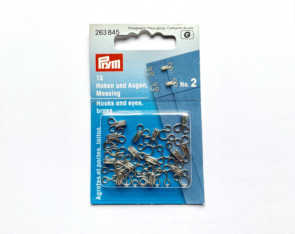 263845 Ganci ed occhielli ottone No. 2 argento – 12pz